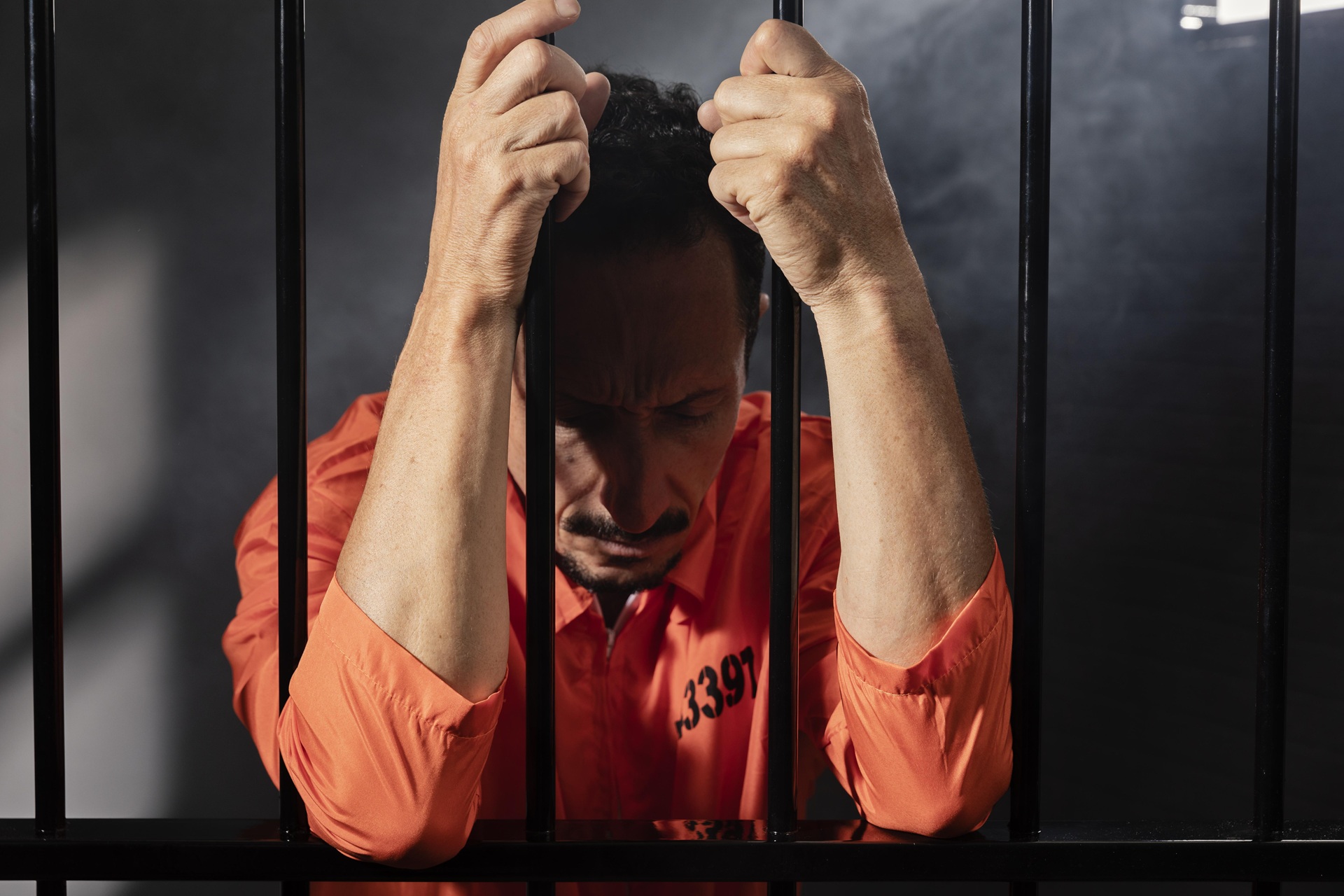 middle aged man spending time jail